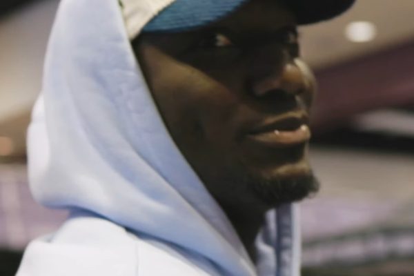 Deebo Samuel in a hoodie and cap during a 2022 public appearance