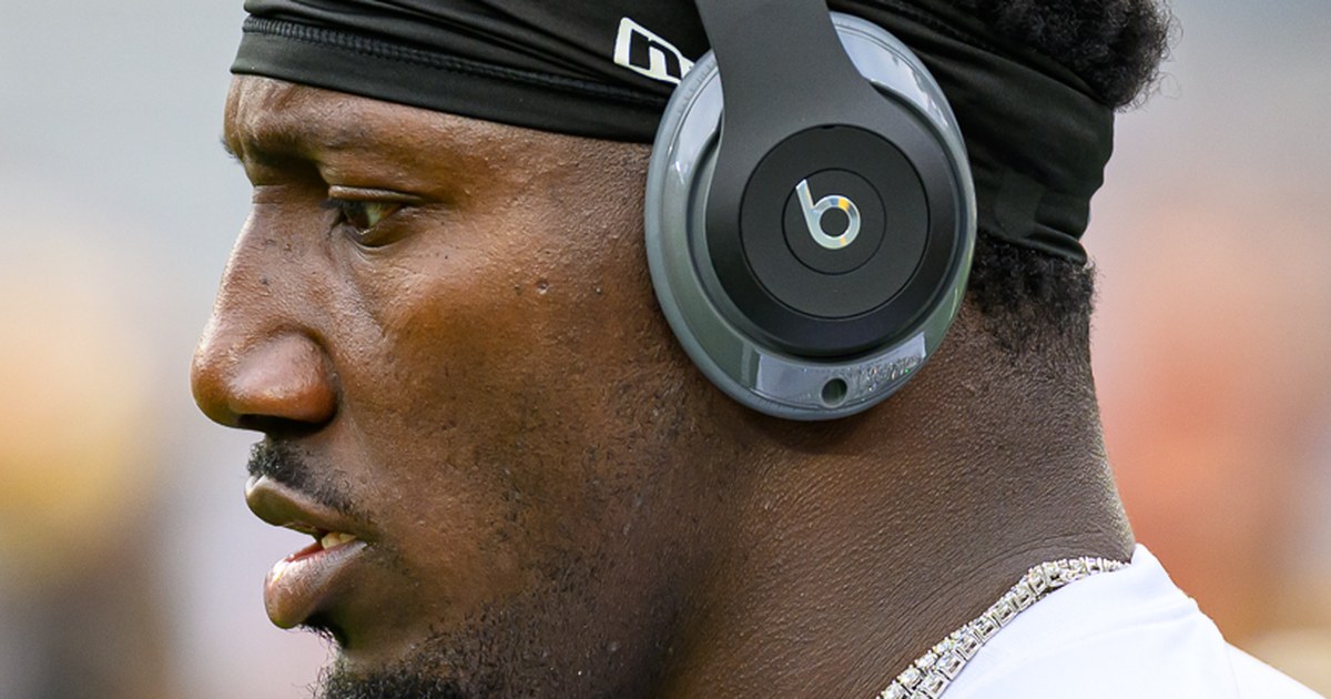 Deebo Samuel wearing Beats headphones on the sidelines, photographed by All-Pro Reels