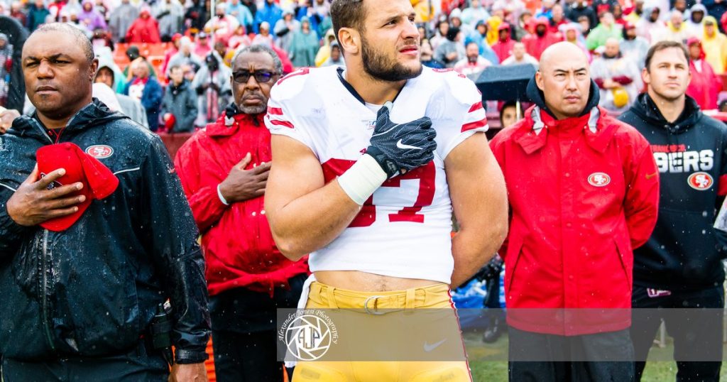 Nick Bosa of the San Francisco 49ers on the sideline before an NFL game