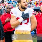 Nick Bosa of the San Francisco 49ers on the sideline before an NFL game